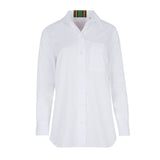 White shirt with green ribbon