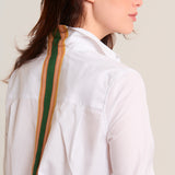 White shirt with green ribbon