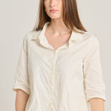 قميص تكنو كريمي مزين بنقوش زهرية