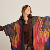 Poncho pancake plumas