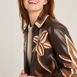 Chaqueta flower cutwork