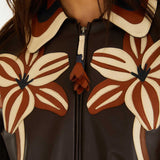 Chaqueta flower cutwork